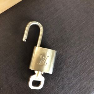 SOLD!!!   Louis Vuitton padlock and key